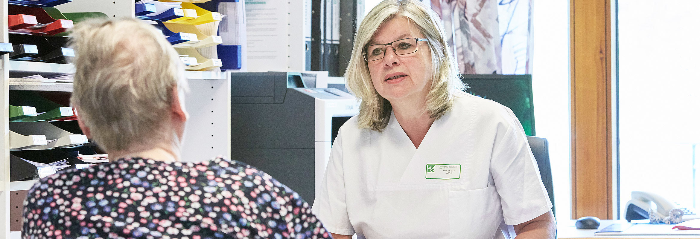 Patientengespräch in der Klinik für Orthopädie und Wirbelsäulenchirurgie in Kusel